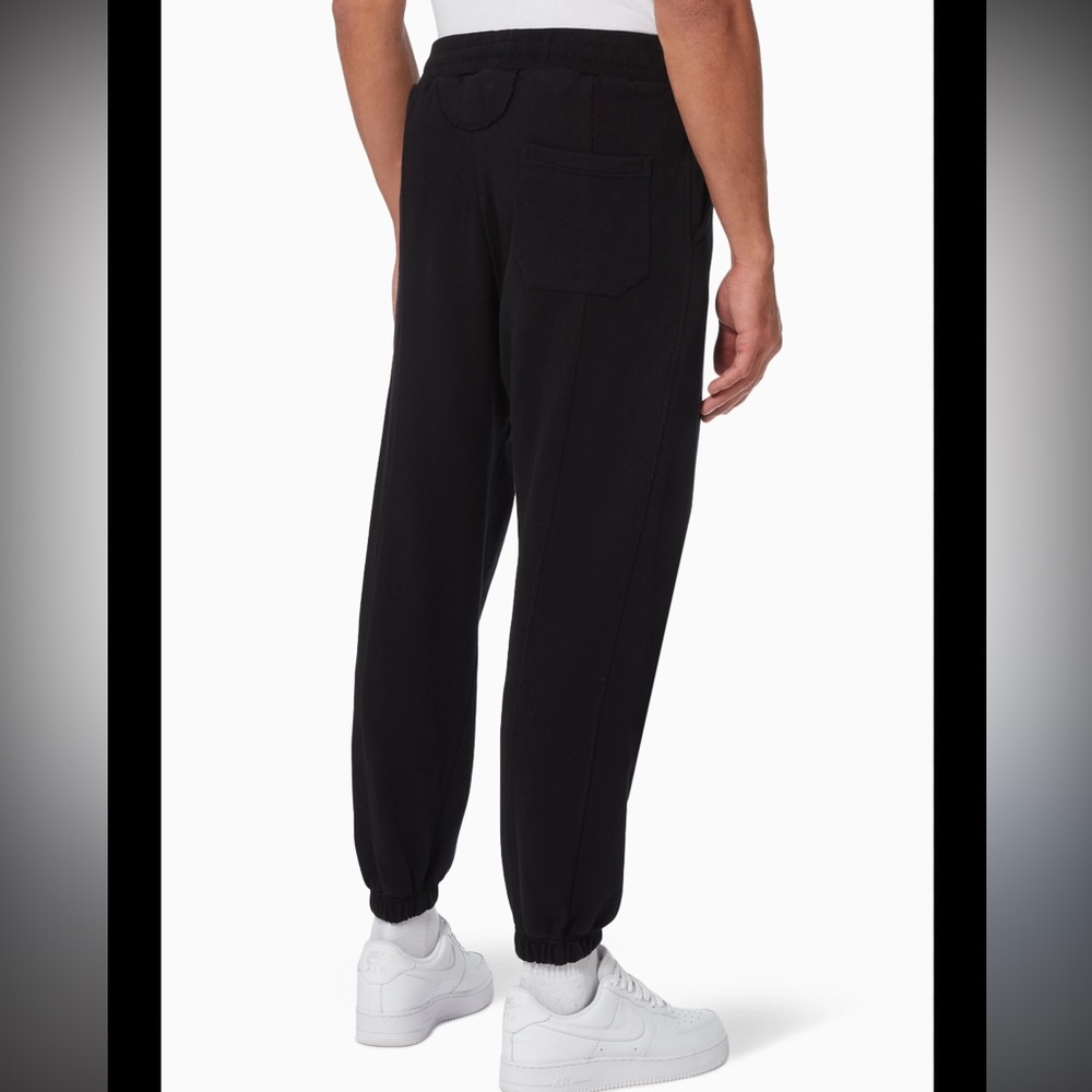 Cole Buxton black jogger sweatpants with pockets and ankle cuffs